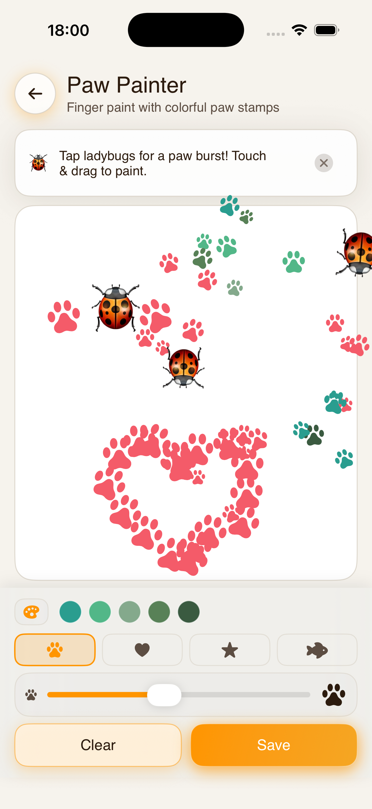 Paw Painter game showing colourful paw prints on a canvas